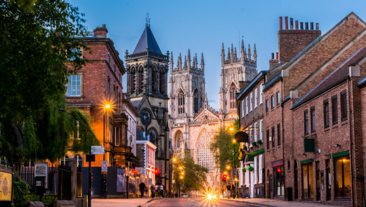 York Sight Loss Council image showing city streets at dusk with York Minster in the background