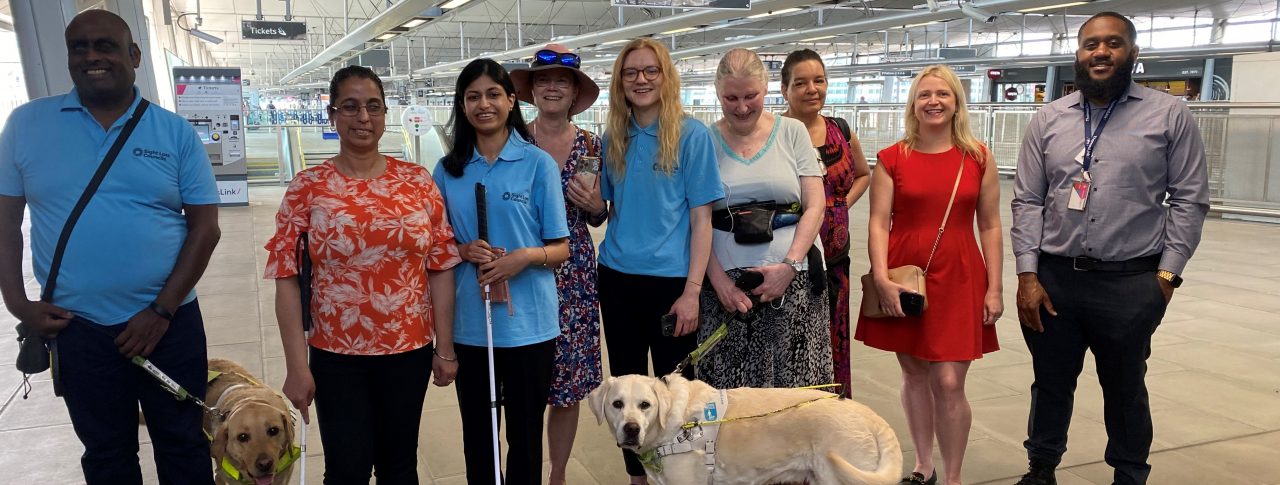 Members of London and SW London SLCs standing in the concourse by the platforms at London Blackfriars. From left to right: Haren, Amrit, Vidya, Vicky, Engagement Manager, Lucy Williams, SLC member Mary, Denise, Sophie, Accessibility Improvement Manager for GTR, and the Blackfriars Station Manager.