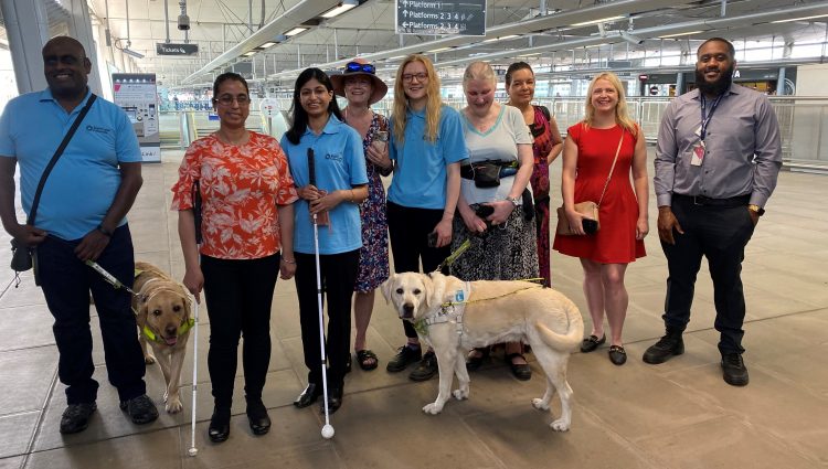 Members of London and SW London SLCs standing in the concourse by the platforms at London Blackfriars. From left to right: Haren, Amrit, Vidya, Vicky, Engagement Manager, Lucy Williams, SLC member Mary, Denise, Sophie, Accessibility Improvement Manager for GTR, and the Blackfriars Station Manager.