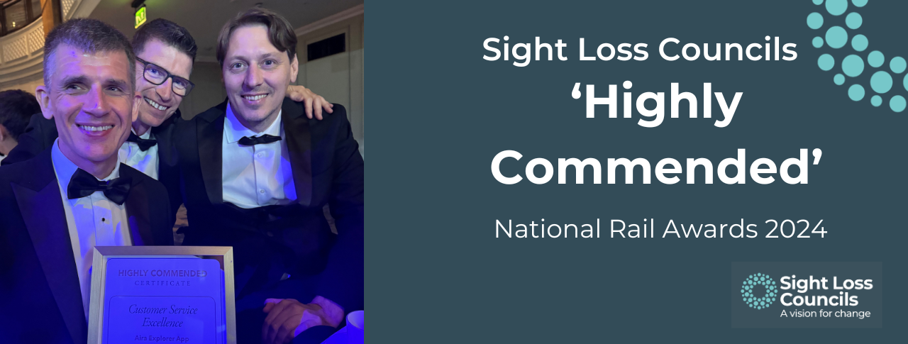 [Three are smiling at the camera, wearing smart attire and holding an award on the left side of the image. The right shows a dark blow background with, 'Sight Loss Councils Highly Commended National Rail Awards 2024', with the Sight Loss Councils logo showing in the bottom right corner.]