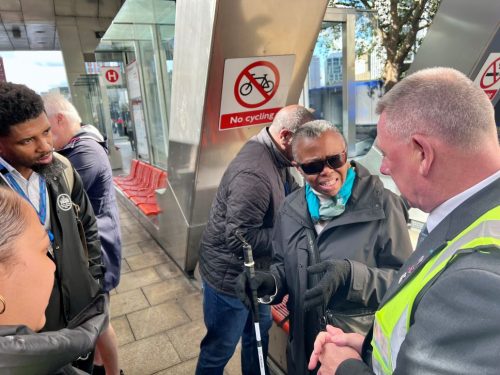 Lola Lee-Walsh, SLC volunteer for South East London, talking to TFL staff