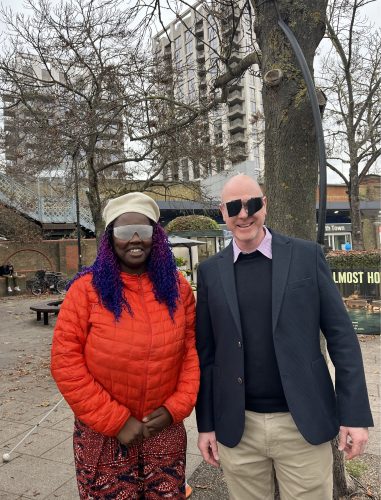 Councillor Kemi Akinola, Deputy Leader of Wandsworth Council, and Sam Merison, Road Safety Manager at Wandsworth and Richmond Council. They are both wearing sim specs.